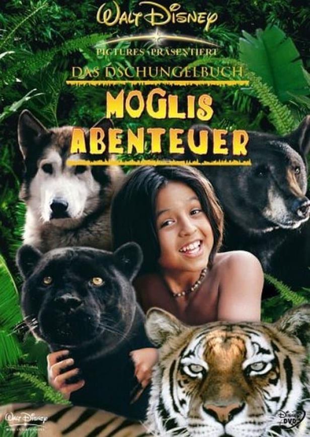 Das Filmplakat zu „Moglis Abenteuer“ zeigt Mogli umgeben von einem Wolf, einem Bären, einem Panther und einem Tiger.