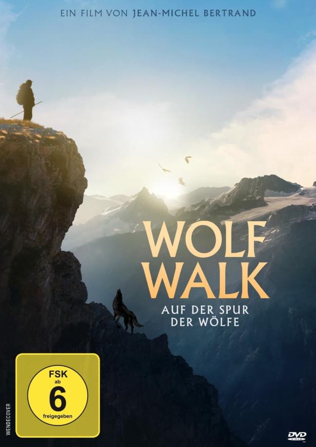 Das Filmplakat für „Wolf Walk – Auf der Spur der Wölfe“ zeigt einen Mann und einen Wolf in einer Berglandschaft.