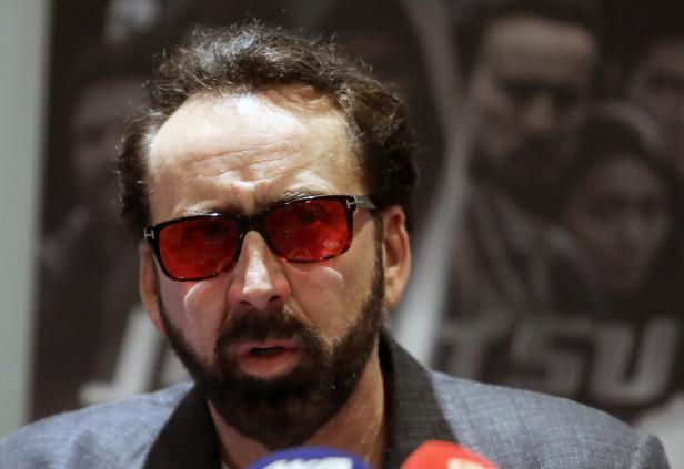 Actor Nicolas Cage talks during a news conference for the film 'Jiu Jitsu' in Nicosia