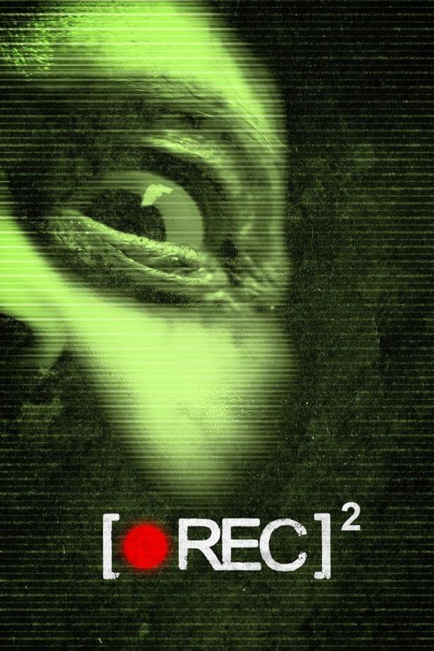 Das grünliche Poster für den Horrorfilm „[REC] 2“ zeigt ein verzerrtes Gesicht und den Filmtitel.