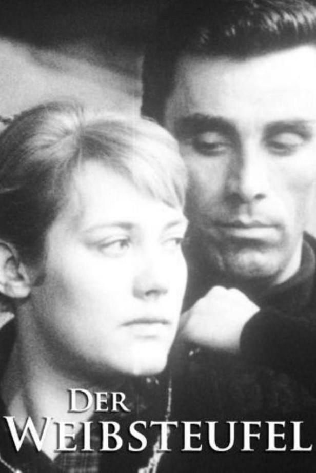 Schwarzweiß-Poster für den Film „Der Weibsteufel“ mit zwei Schauspielern.
