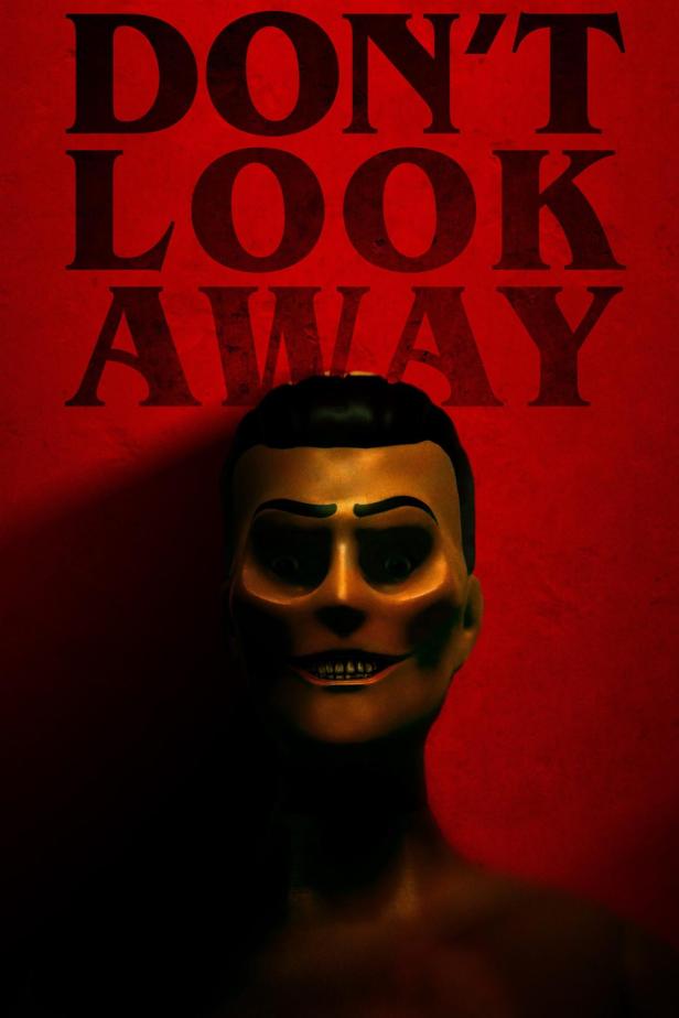 Das Gesicht einer unheimlichen Puppe vor einem roten Hintergrund mit der Aufschrift „Don't Look Away“.