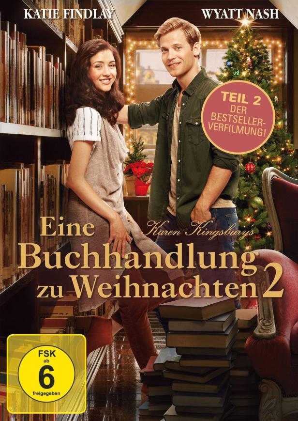 Das Filmplakat für „Eine Buchhandlung zu Weihnachten 2“ mit Katie Findlay und Wyatt Nash vor einem Weihnachtsbaum.