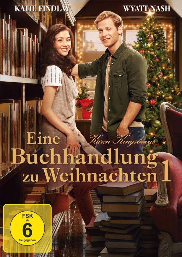 Das Filmplakat für „Eine Buchhandlung zu Weihnachten 1“ mit Katie Findlay und Wyatt Nash vor einem Weihnachtsbaum.