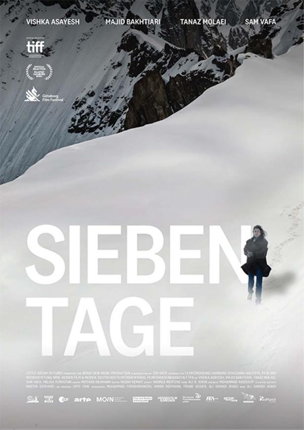 Das Filmplakat für „Sieben Tage“ zeigt eine Frau in einer verschneiten Berglandschaft.