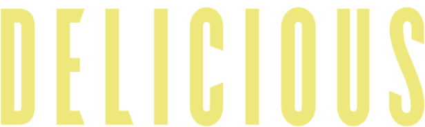 Das Wort „Delicious“ in gelber Schrift auf schwarzem Hintergrund.