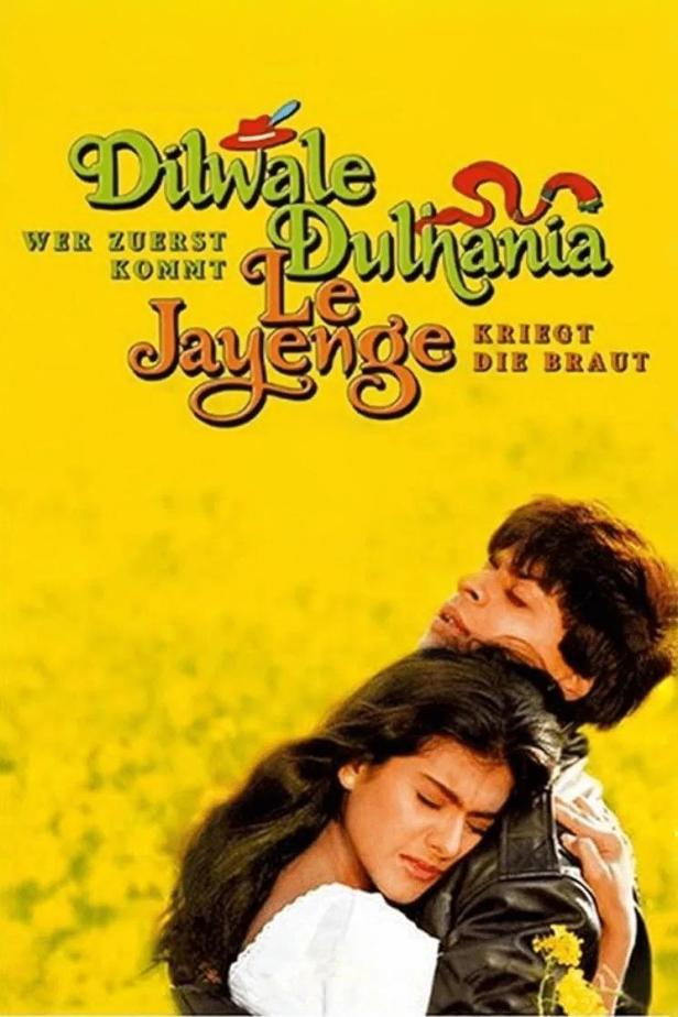 Das Filmplakat für „Dilwale Dulhania Le Jayenge – Wer zuerst kommt, kriegt die Braut“ zeigt ein Paar in einer Umarmung.