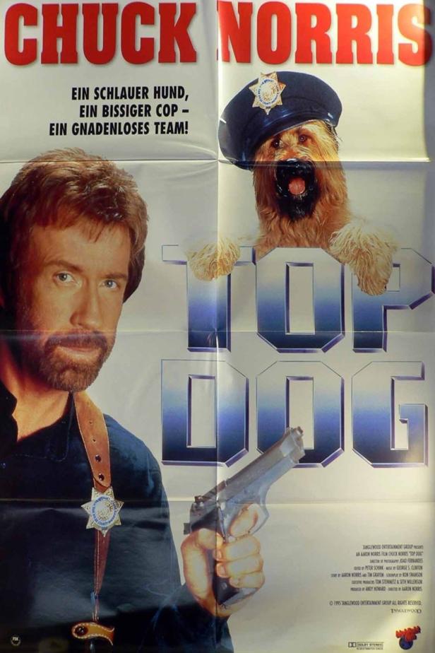 Filmposter für „Top Dog“ mit Chuck Norris und einem Hund mit Polizeimütze.