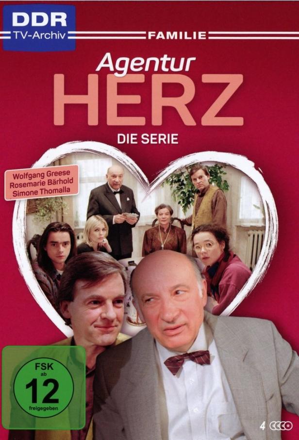 Das Cover der DDR-Serie „Familie Agentur Herz“ mit den Schauspielern Wolfgang Greese, Rosemarie Bärhold und Simone Thomalla.