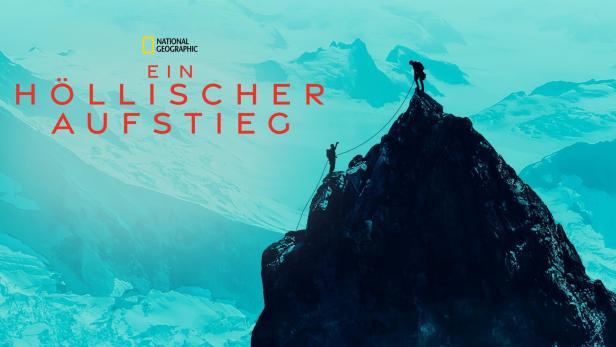 Zwei Bergsteiger erklimmen einen steilen, schneebedeckten Gipfel.