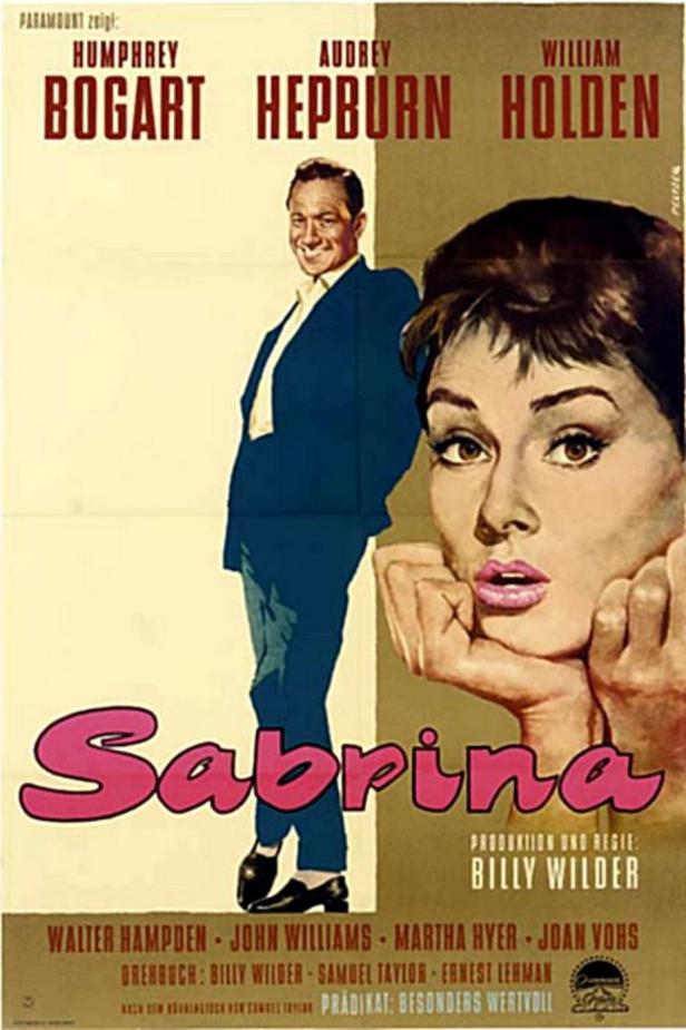 Das Filmplakat für „Sabrina“ mit Humphrey Bogart, Audrey Hepburn und William Holden.
