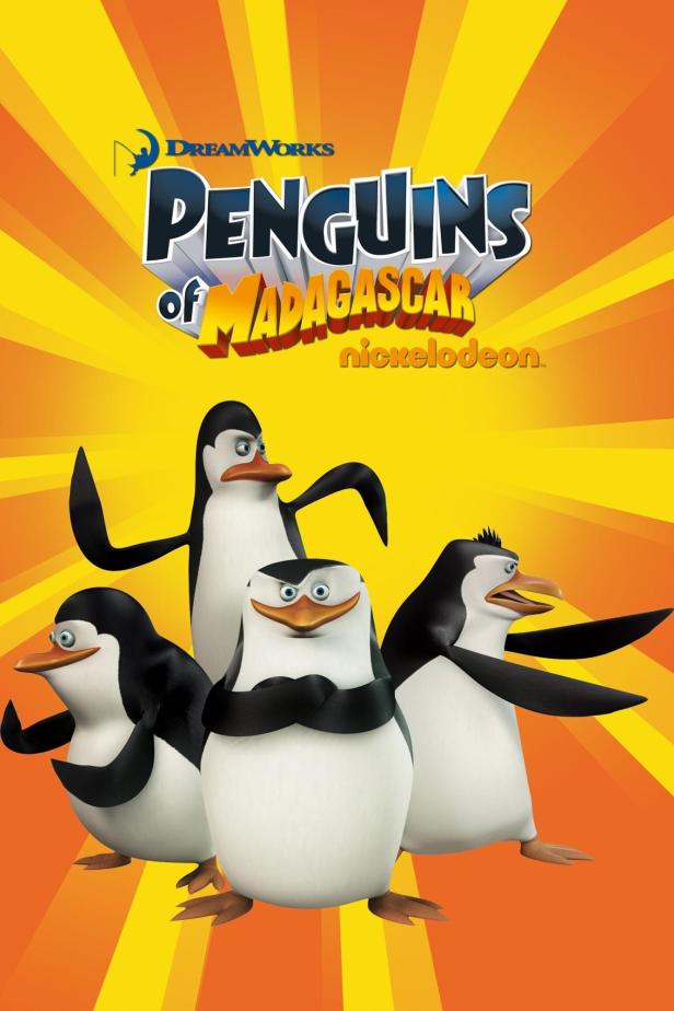 Das Filmplakat für „Die Pinguine aus Madagascar“ zeigt die vier Pinguine vor einem gelb-orangen Hintergrund.