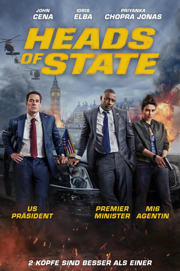 Das Filmplakat für „Heads of State“ zeigt John Cena, Idris Elba und Priyanka Chopra Jonas vor einem zerstörten Auto.
