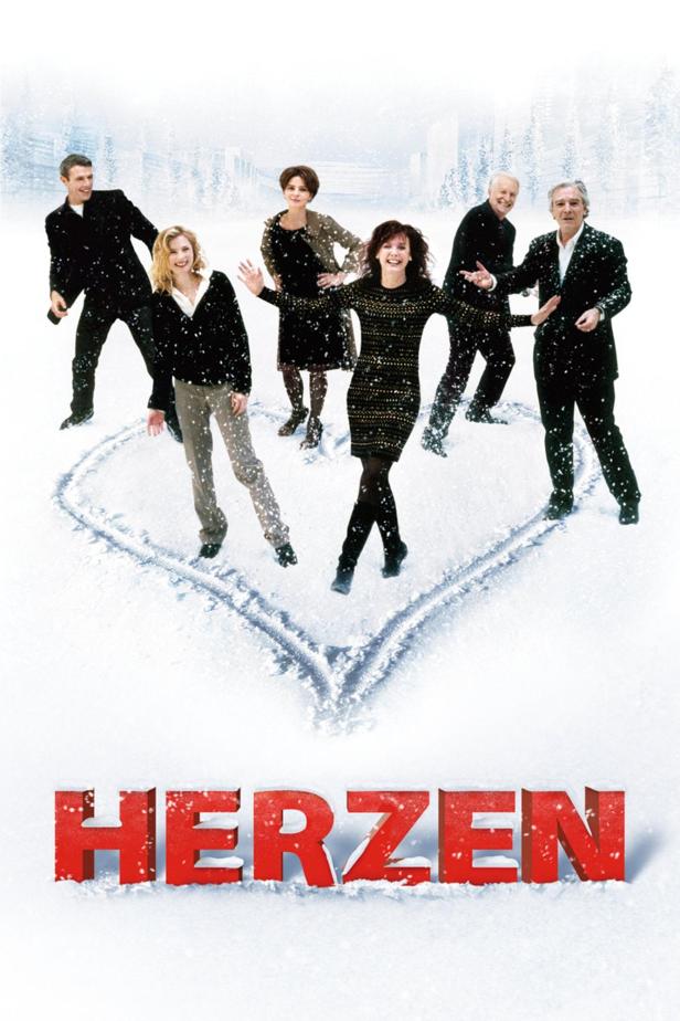 Das Filmplakat für „Herzen“ zeigt sechs Personen, die in einem Herz im Schnee stehen.