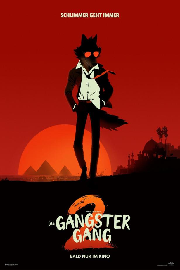 Ein anthropomorpher Wolf im Anzug steht vor einer Skyline mit Pyramiden für den Film „Die Gangster Gang 2“.