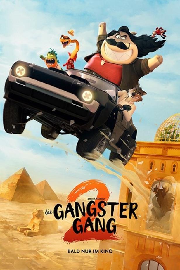 Das Filmplakat für „Die Gangster Gang 2“ zeigt die animierten Charaktere in einem fliegenden Auto vor einer Wüstenkulisse.