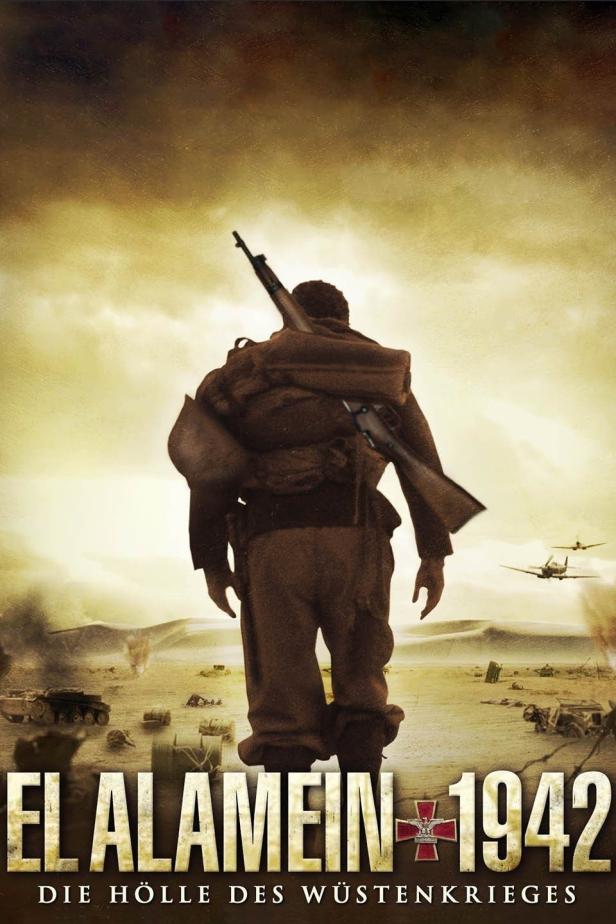 Ein Soldat mit Gewehr auf dem Rücken durchquert eine Wüstenlandschaft, im Hintergrund Flugzeuge.