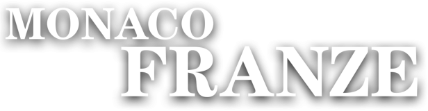 Der Schriftzug „Monaco Franze“ in weißer Schrift auf schwarzem Hintergrund.