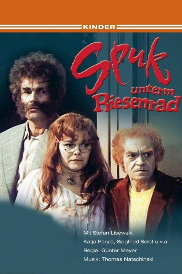 Das Filmplakat zu „Spuk unterm Riesenrad“ mit den Schauspielern Stefan Lisewski, Katja Paryla und Siegfried Seibt.
