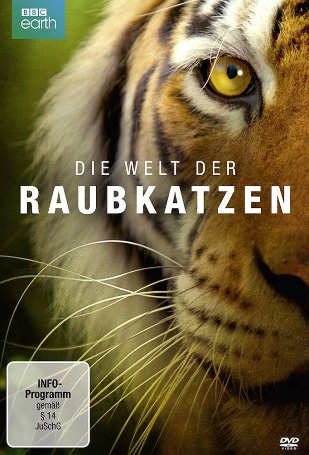 Das Cover der BBC Earth Dokumentation „Die Welt der Raubkatzen“ zeigt das Gesicht eines Tigers.