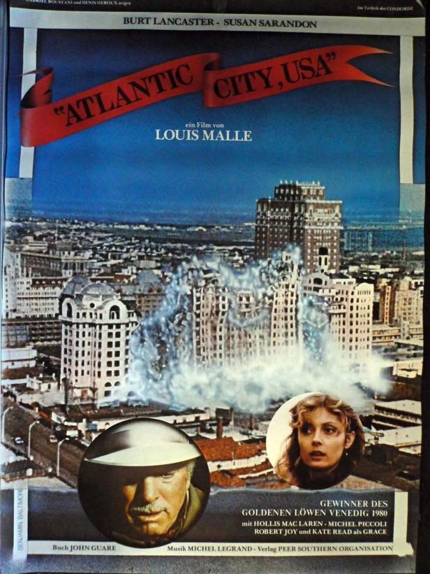 Das Filmplakat für „Atlantic City, USA“ mit Burt Lancaster und Susan Sarandon vor der Skyline der Stadt.