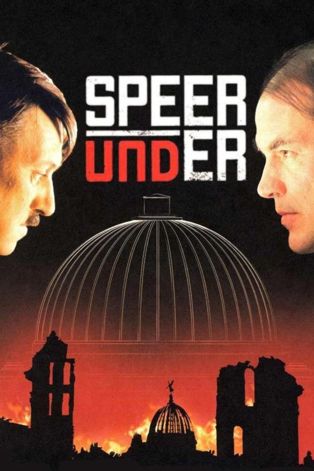 Das Filmplakat zu „Speer und Er“. Es zeigt die Gesichter von Hitler und Albert Speer vor zerstörter Architektur.