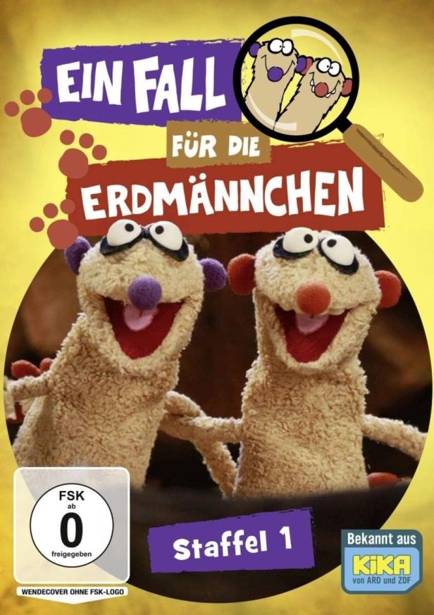 Das Cover der ersten Staffel von „Ein Fall für die Erdmännchen“ mit zwei Erdmännchen-Handpuppen.
