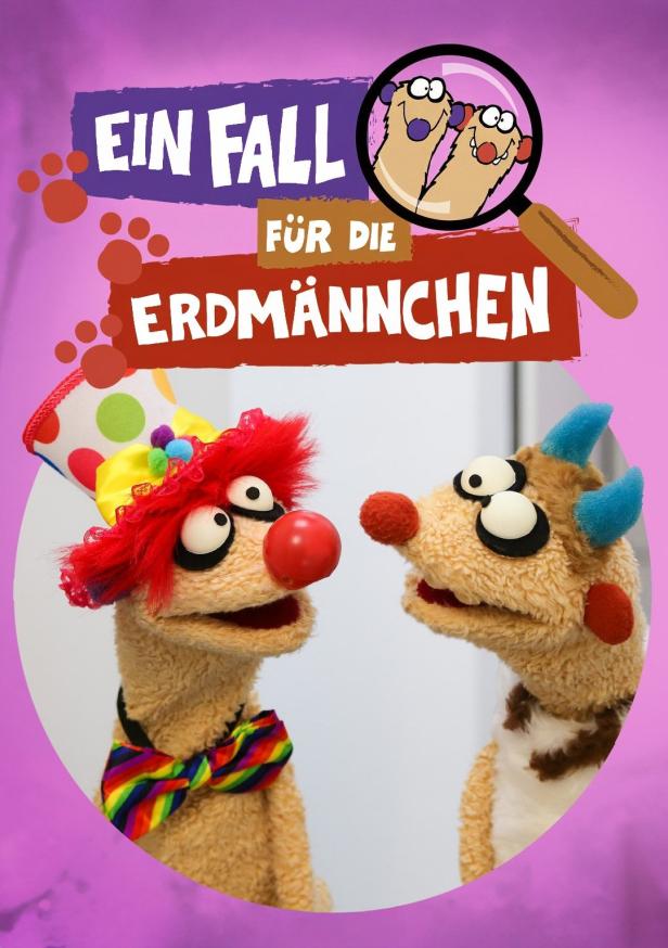 Das Poster für „Ein Fall für die Erdmännchen“ zeigt zwei Handpuppen-Erdmännchen.