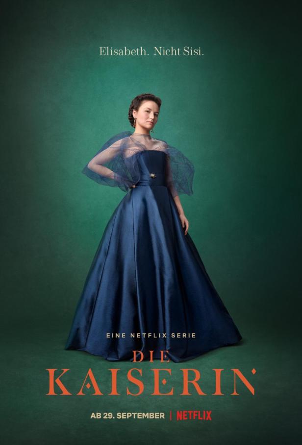 Das Poster der Netflix-Serie „Die Kaiserin“ zeigt eine Frau in einem blauen Kleid.