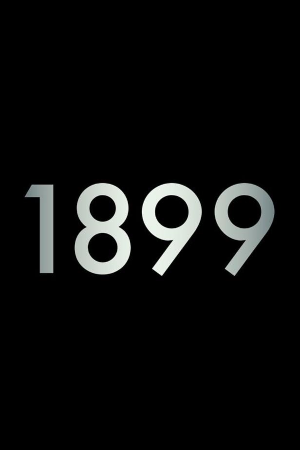 Die Zahl 1899 in silberner Farbe auf schwarzem Hintergrund.