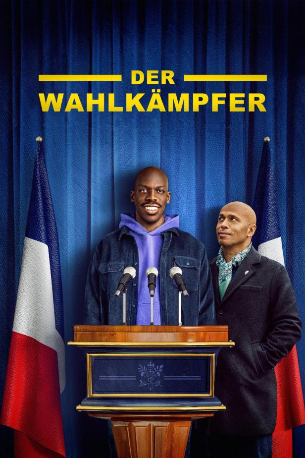 Das Filmplakat für „Der Wahlkämpfer“ zeigt zwei Männer vor französischen Flaggen an einem Rednerpult.