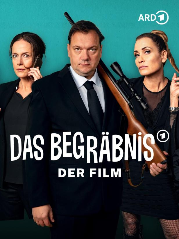 Das Filmplakat zu „Das Begräbnis“ zeigt drei Personen, von denen eine ein Gewehr trägt.