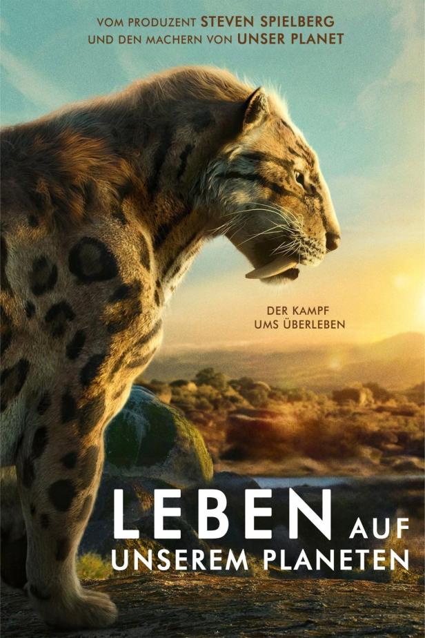 Das Poster zur Dokumentarserie „Leben auf unserem Planeten“ zeigt eine Säbelzahnkatze.