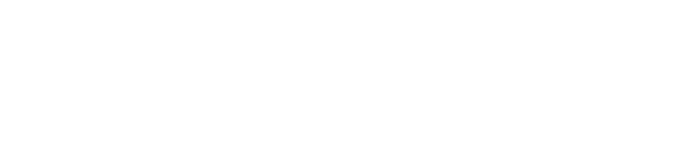 Der Schriftzug „Schumacher“ in weißer, fetter Schrift auf schwarzem Hintergrund.