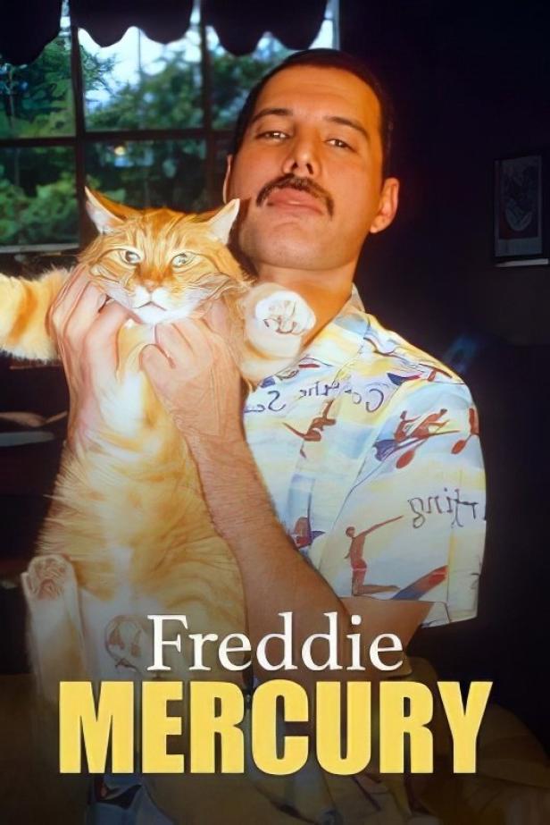 Freddie Mercury hält eine orangefarbene Katze im Arm.