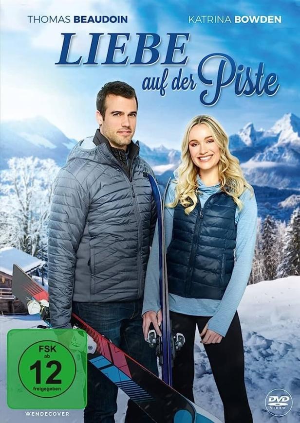Das Filmplakat für „Liebe auf der Piste“ mit Thomas Beaudoin und Katrina Bowden vor einer verschneiten Bergkulisse.