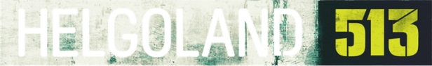 Das Wort „Helgoland“ und die Zahl „513“ in grüner Farbe auf einem Schild.