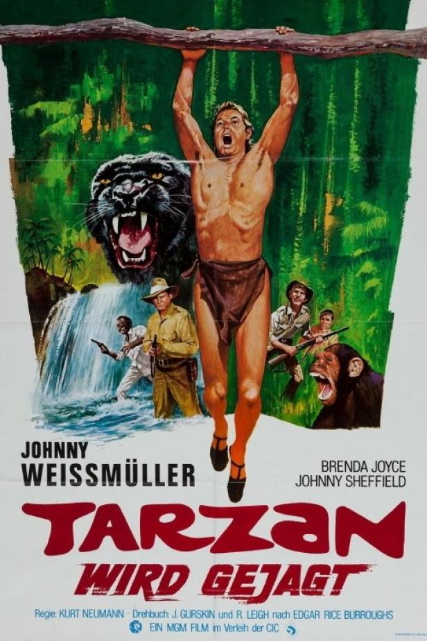 Das Filmplakat für „Tarzan wird gejagt“ mit Johnny Weissmüller, einem Panther und weiteren Dschungelbewohnern.