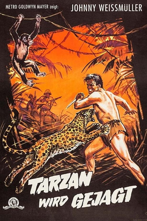 Das Filmplakat „Tarzan wird gejagt“ zeigt Johnny Weissmüller im Kampf mit einem Leoparden.