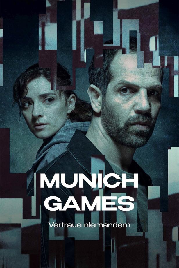 Das Filmplakat für „Munich Games“ zeigt ein Paar vor einem abstrakten Hintergrund.