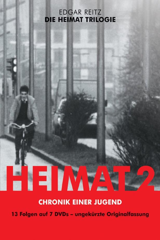 Das Cover der DVD „Heimat 2“ von Edgar Reitz zeigt einen Mann auf einem Fahrrad.