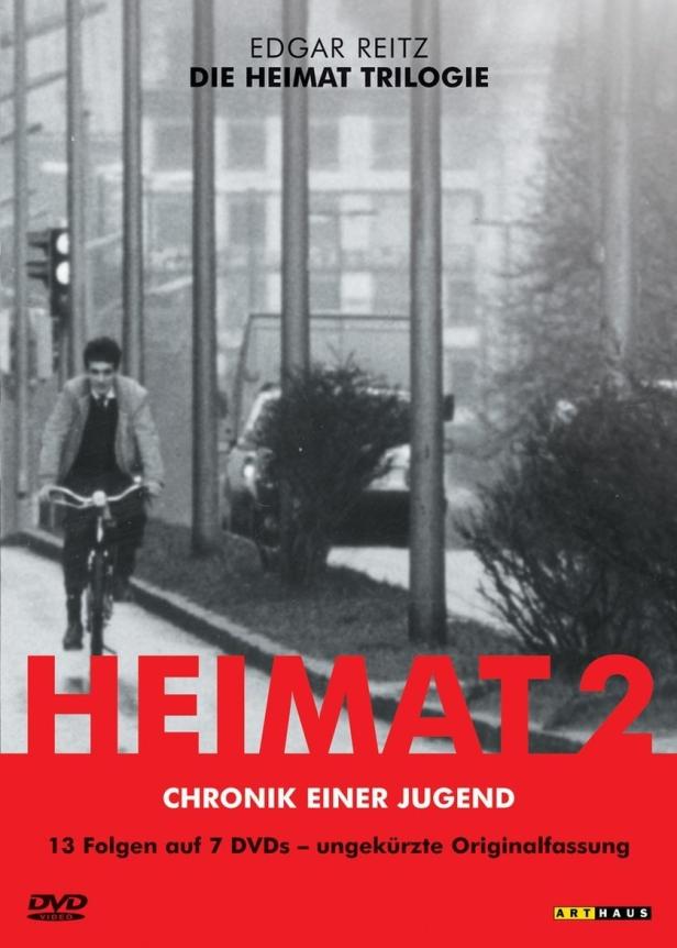 Das Cover der DVD „Heimat 2 – Chronik einer Jugend“ von Edgar Reitz zeigt einen Radfahrer in Schwarzweiß.