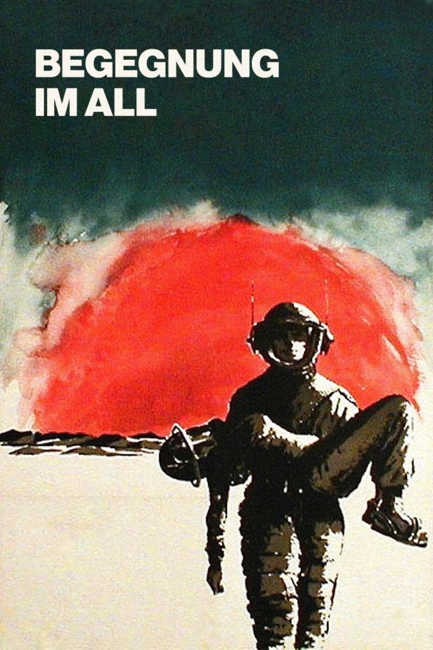 Ein Astronaut trägt einen anderen Astronauten vor einem roten Himmel.