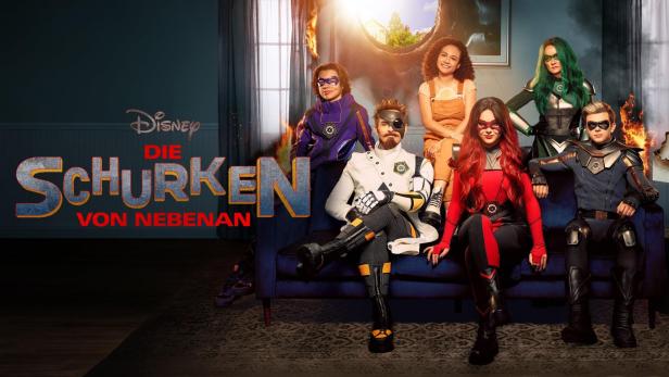 Das Poster für die Disney+-Serie „Die Schurken von Nebenan“ zeigt die Hauptdarsteller in Superheldenkostümen.