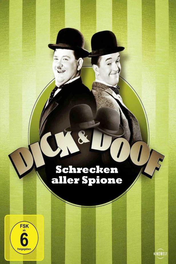 Das Filmplakat für „Dick & Doof – Schrecken aller Spione“ zeigt die beiden Komiker mit Melone.