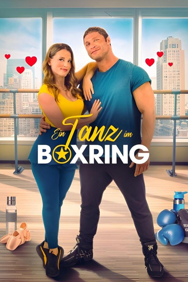 Das Filmplakat für „Ein Tanz im Boxring“ zeigt eine Frau und einen Mann vor einer Skyline.