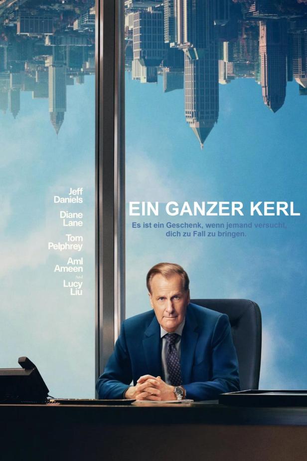 Das Filmplakat für „Ein ganzer Kerl“ zeigt Jeff Daniels vor einer Skyline, die auf dem Kopf steht.