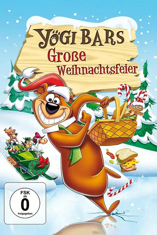 Das Cover von „Yogi Bärs Große Weihnachtsfeier“ zeigt Yogi mit einem Picknickkorb im Schnee.
