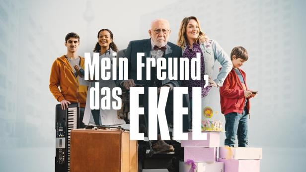 Das Filmplakat zu „Mein Freund, das Ekel“ zeigt eine Gruppe von Menschen unterschiedlichen Alters vor einem Hochhaus.