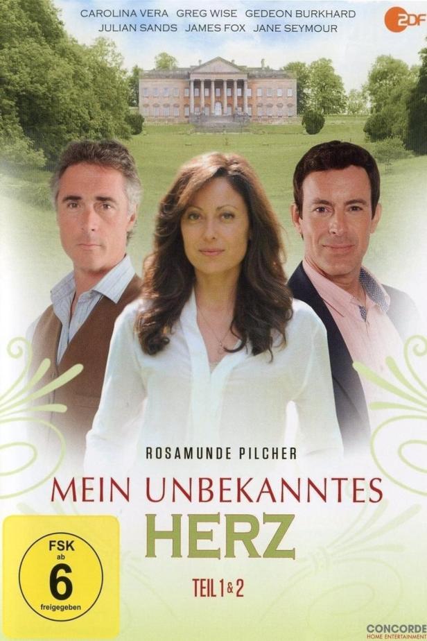 Das Cover von Rosamunde Pilchers „Mein unbekanntes Herz“ mit den Schauspielern und einem Herrenhaus im Hintergrund.